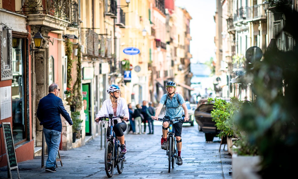 Cycling through old cobbled streets in Cagliari