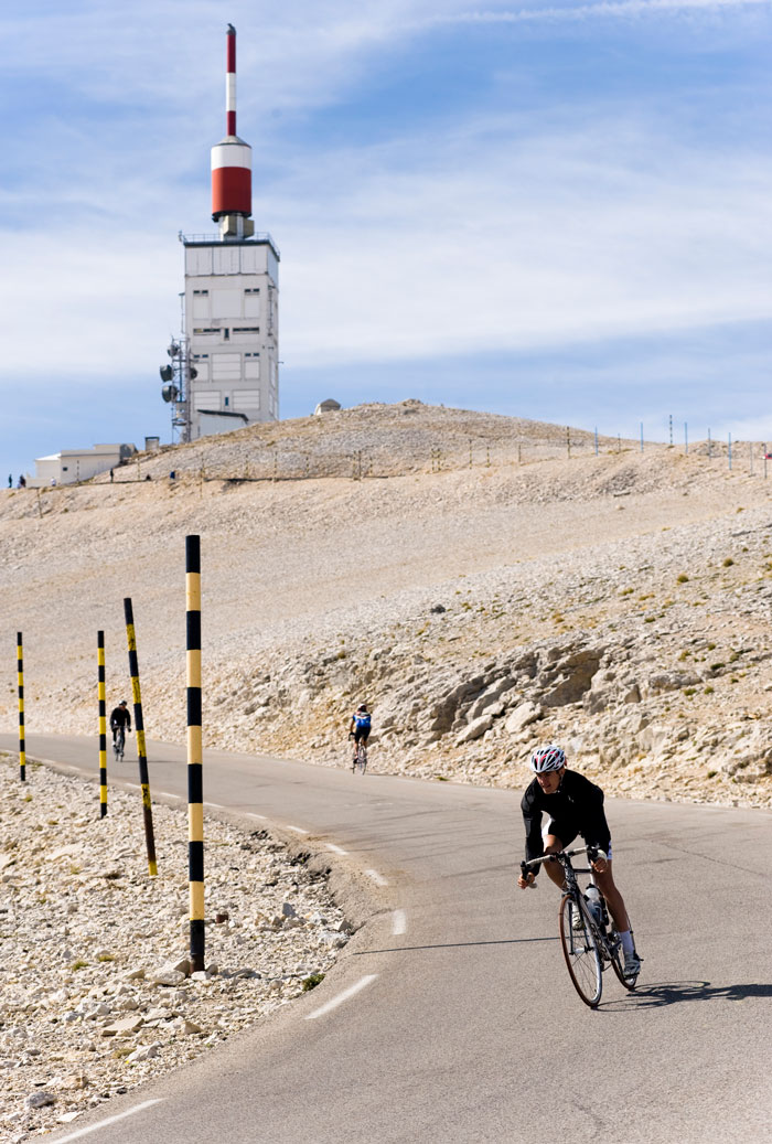 A cyclist descends from the summit of Mont Ventoux