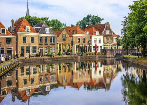 traditional-holland-and-belgium-houses-skedaddle-cycling-tour-boat.jpg