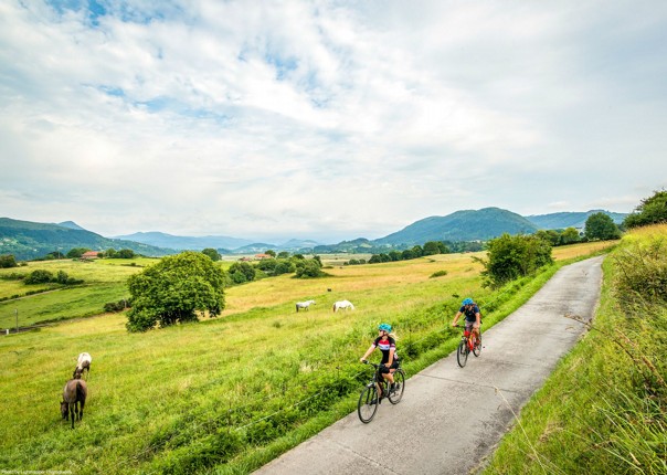 Two cyclists riding in the Basque Country region in northern Spain