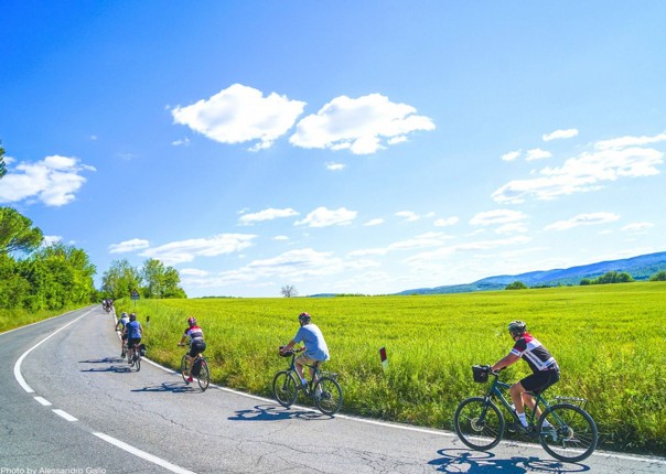 Group of cyclists on a guided cycling tour in Italy