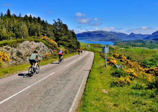 Scenic road cycling along the North Coast 500 route in the Scottish Highlands