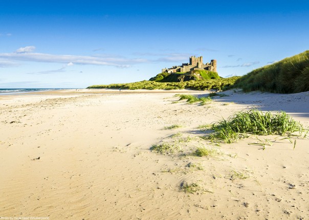 coast-beach-bike-tour-uk-self-guided-saddle-skedaddle-warkworth-castle.jpg