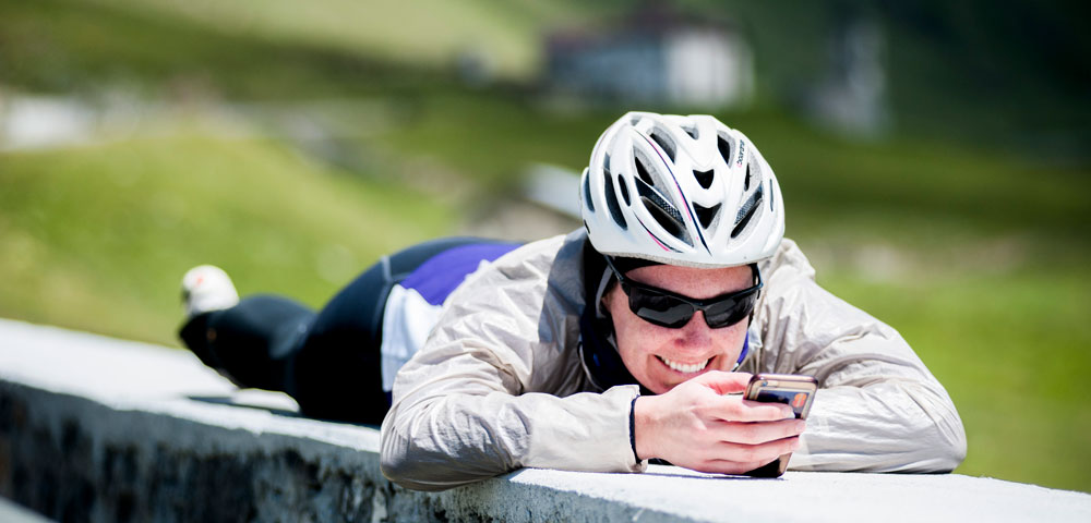Cyclist reading their phone